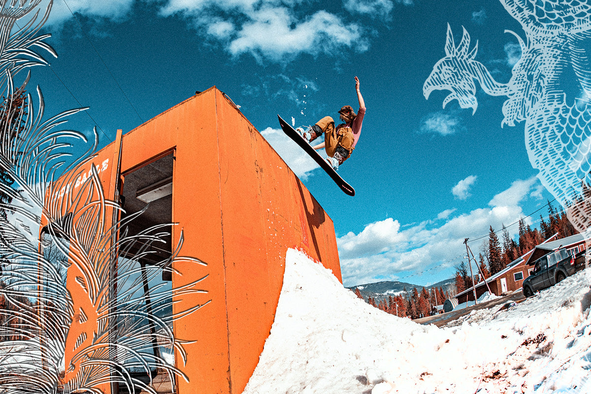 An image of a snowboarder jibbing an orange abandoned chairlift terminal on the Pallas Hedonist snowboard. Line drawing illustrations from the new Arcana Collection are layered on top of the photo.